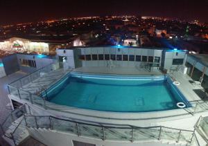 Vista de la piscina de Mira Suites Prince Sultan Street-Jeddah o alrededores