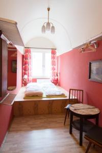 Voodi või voodid majutusasutuse Labyrinth Hostel Weimar toas