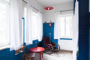 Istumisnurk majutusasutuses Labyrinth Hostel Weimar