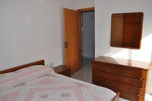 A bed or beds in a room at Summerhouse Sagana
