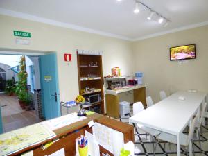 TV a/nebo společenská místnost v ubytování Hostal Campo Nuevo