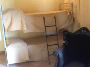 A bed or beds in a room at Il Ghetto Farm Holiday