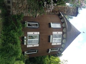 Photo de la galerie de l'établissement Gite la Tourelle du Cap, à La Malbaie