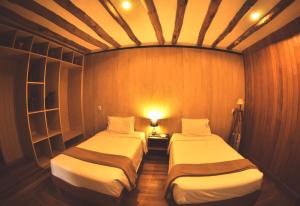 Postel nebo postele na pokoji v ubytování Nao Victoria Hostel