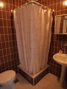 Koupelna v ubytování Apartments Adria