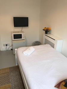 Ліжко або ліжка в номері Circle Guest House Bed Only