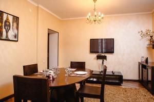 TV a/nebo společenská místnost v ubytování Totem Hotel