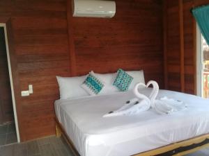Postel nebo postele na pokoji v ubytování Hotelito Villas Holbox