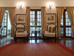 Posezení v ubytování Le Colonial 1506 - Exclusive Luxury Hideaway