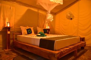 Letto o letti in una camera di Jungle View River Camping