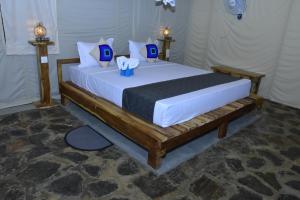 Letto o letti in una camera di Jungle View River Camping