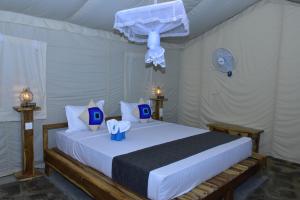 Letto o letti in una camera di Jungle View River Camping