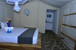 Letto o letti in una camera di Jungle View River Camping