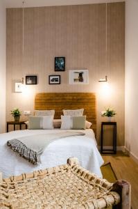 Ένα ή περισσότερα κρεβάτια σε δωμάτιο στο Casas del Albaicín
