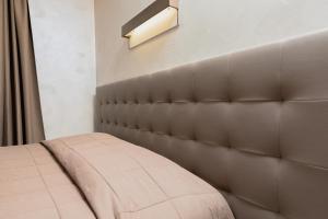 Postel nebo postele na pokoji v ubytování Motel D'ornex
