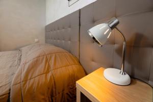 Postel nebo postele na pokoji v ubytování Motel D'ornex