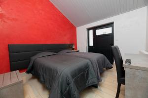 Postel nebo postele na pokoji v ubytování Motel D'ornex
