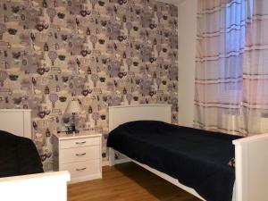 Cama o camas de una habitación en Clean&Comfort Apartments Near Hannover Fairgrounds