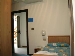 Letto o letti in una camera di Hotel Marguareis