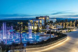 a view of a fountain in front of a building at San Barbato Resort Spa & Golf in Lavello