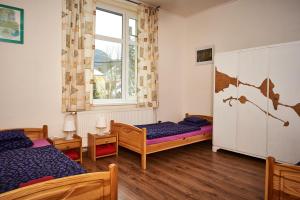 Postel nebo postele na pokoji v ubytování U Kosti - Bohemian Switzerland