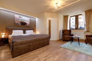 Posteľ alebo postele v izbe v ubytovaní Apartments Menuet