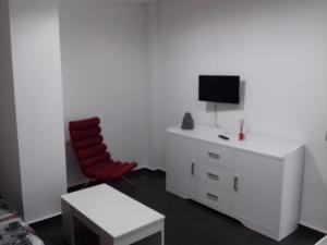 TV a/nebo společenská místnost v ubytování Apartamentos Turísticos Los Ángeles