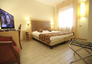 Cama o camas de una habitación en Scarlatti Hotel Milano