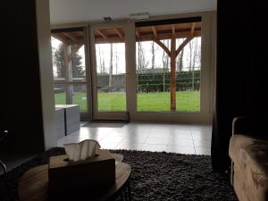Posezení v ubytování B&B Maison Kerkhove