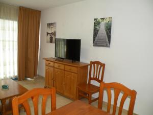 Un televizor și/sau centru de divertisment la Kennedy 1 - Fincas Arena