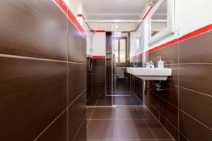 Kúpeľňa v ubytovaní Apartments Menuet + 21 fotografií