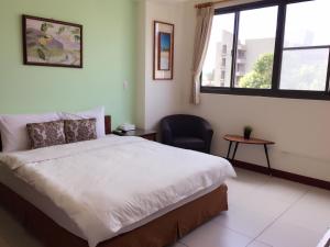 Voodi või voodid majutusasutuse Corner No.56 Guest House toas