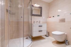 Kúpeľňa v ubytovaní Apartments Menuet