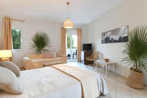 Ein Bett oder Betten in einem Zimmer der Unterkunft Asteras Paradise