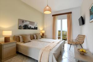 Ein Bett oder Betten in einem Zimmer der Unterkunft Asteras Paradise