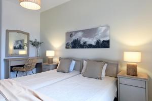 Ein Bett oder Betten in einem Zimmer der Unterkunft Asteras Paradise