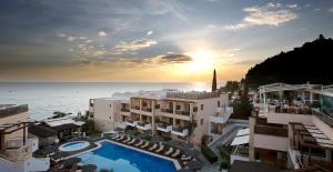 a view of the ocean from a hotel at Olympion Sunset Halkidiki in Fourka