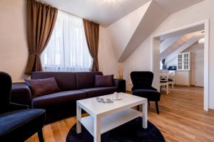 Posezení v ubytování Apartments Menuet