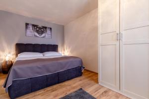 Posteľ alebo postele v izbe v ubytovaní Apartments Menuet