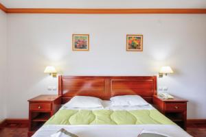 Cama o camas de una habitación en Luso Village Boutique Hotel