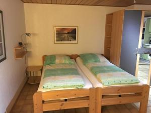 Llit o llits en una habitació de Ferienwohnungen Schäferfeld