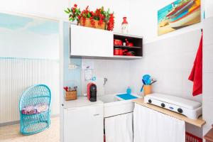 Kuchyň nebo kuchyňský kout v ubytování Casa Corallo + 22 fotografií