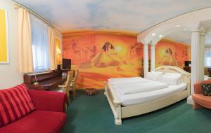 Postel nebo postele na pokoji v ubytování Hotel Plankl