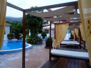 The swimming pool at or close to Enalion Hotel