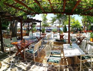 A restaurant or other place to eat at Enalion Hotel