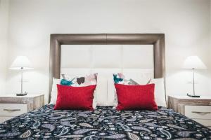 Säng eller sängar i ett rum på Apartamento Aurora