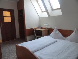 Łóżko lub łóżka w pokoju w obiekcie Hotel Górecki