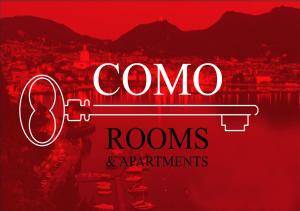 um letreiro de néon que lê quartos e apartamentos de ozono em Como Rooms & Apartments T.10 em Como