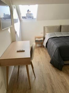 A bed or beds in a room at CORSO VENEZIA APARTMENT