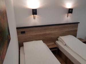 Ένα ή περισσότερα κρεβάτια σε δωμάτιο στο Apartman Simić 2